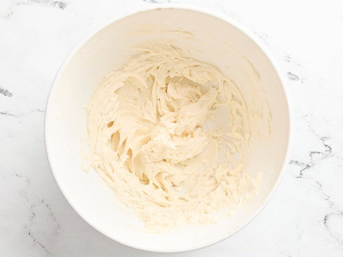 Eggnog cookie frosting in a bowl.