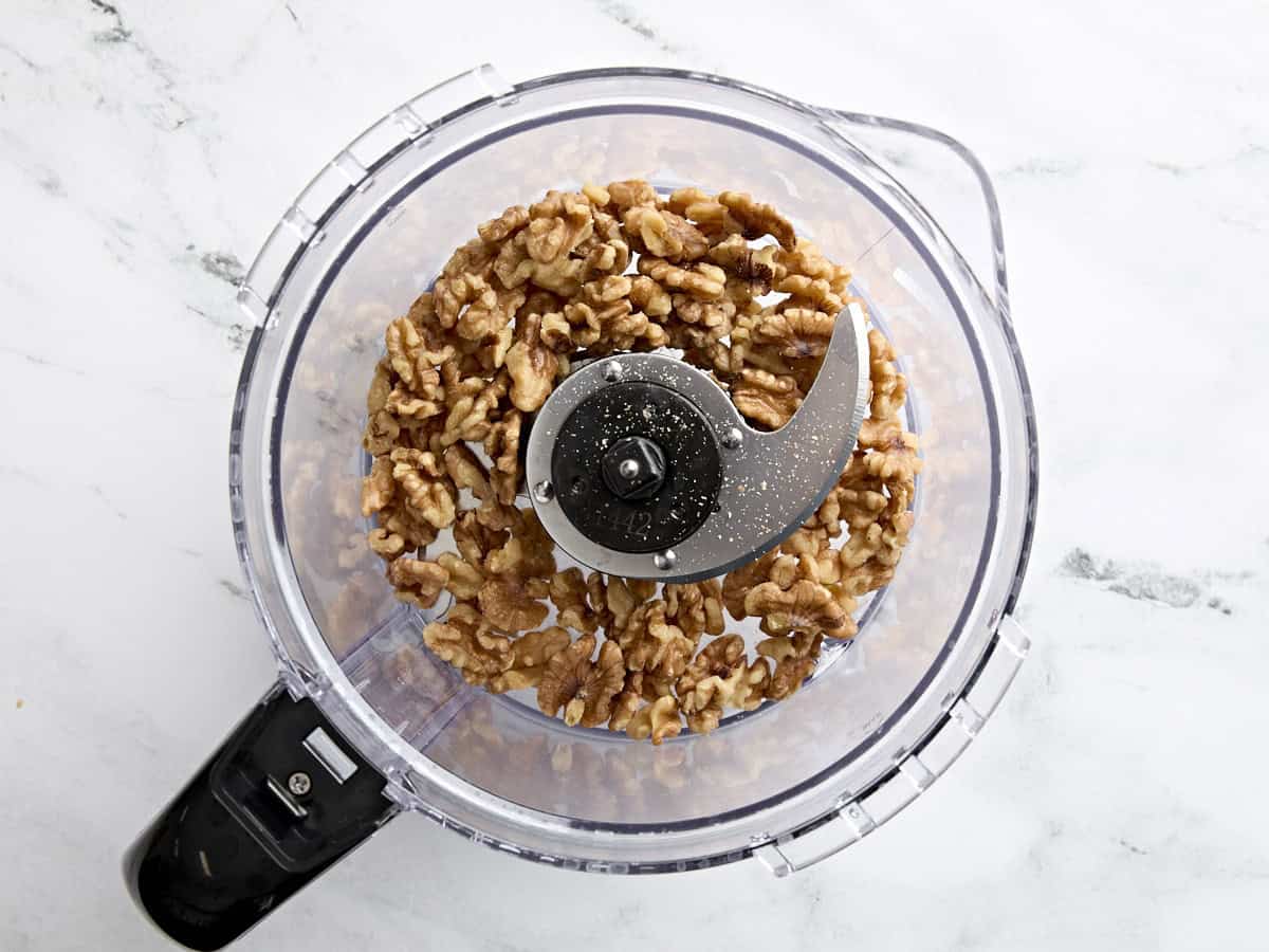 Walnuts in a food processor.