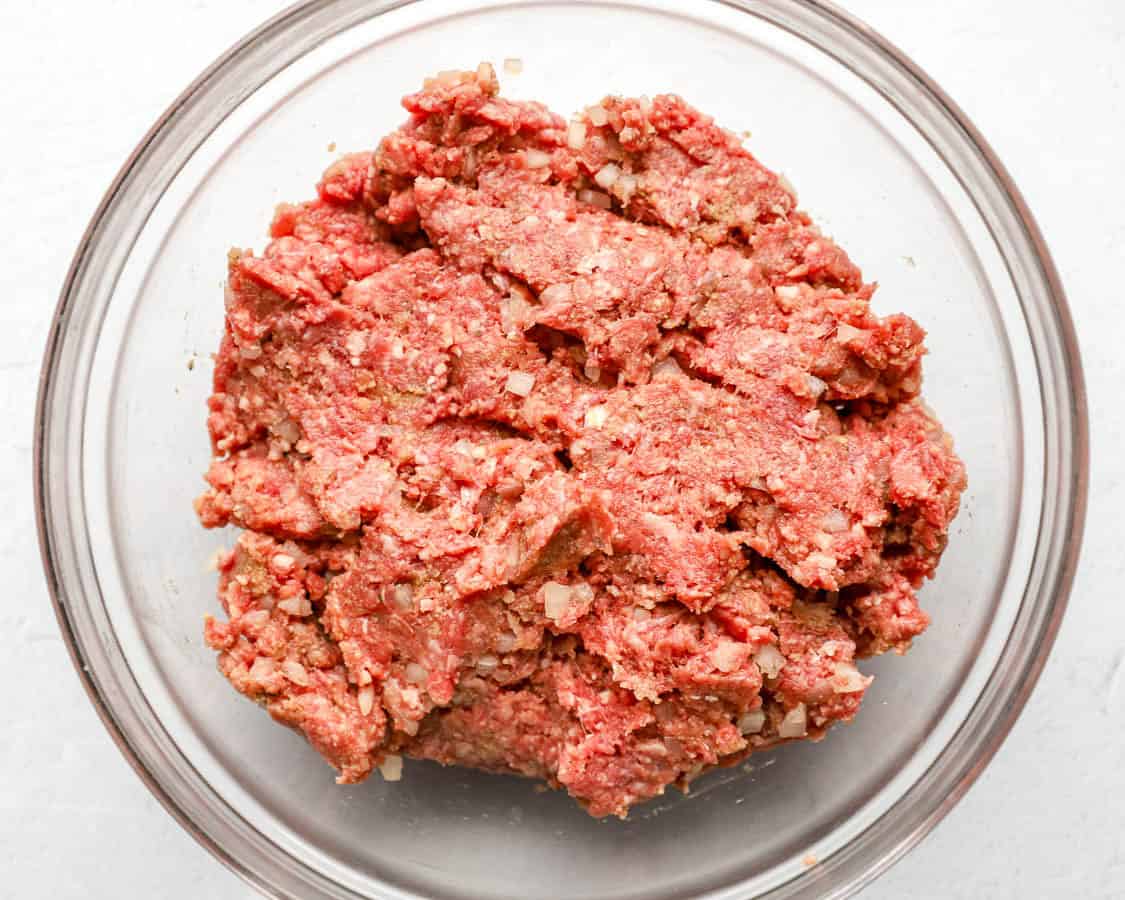 Ground meat mixture in a bowl.