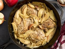 Overhead view of a chicken and apple skillet one pan dinner.