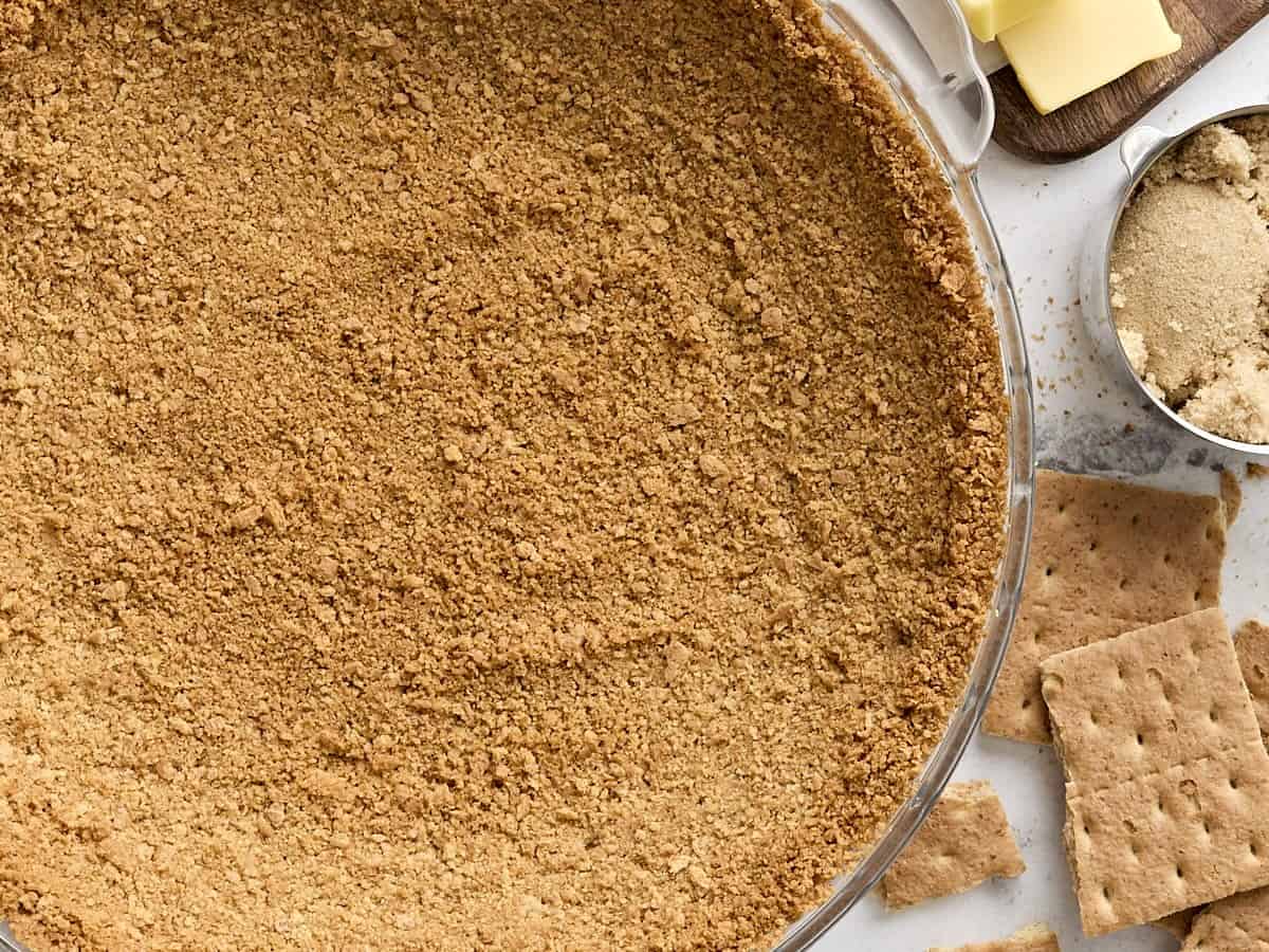 Overhead close up of a graham cracker crust.