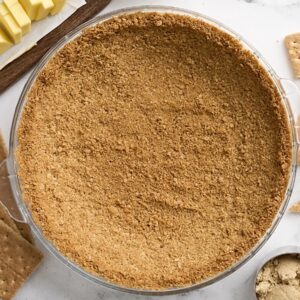 Overhead view of a homemade graham cracker crust.