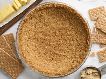 Overhead view of a homemade graham cracker crust.