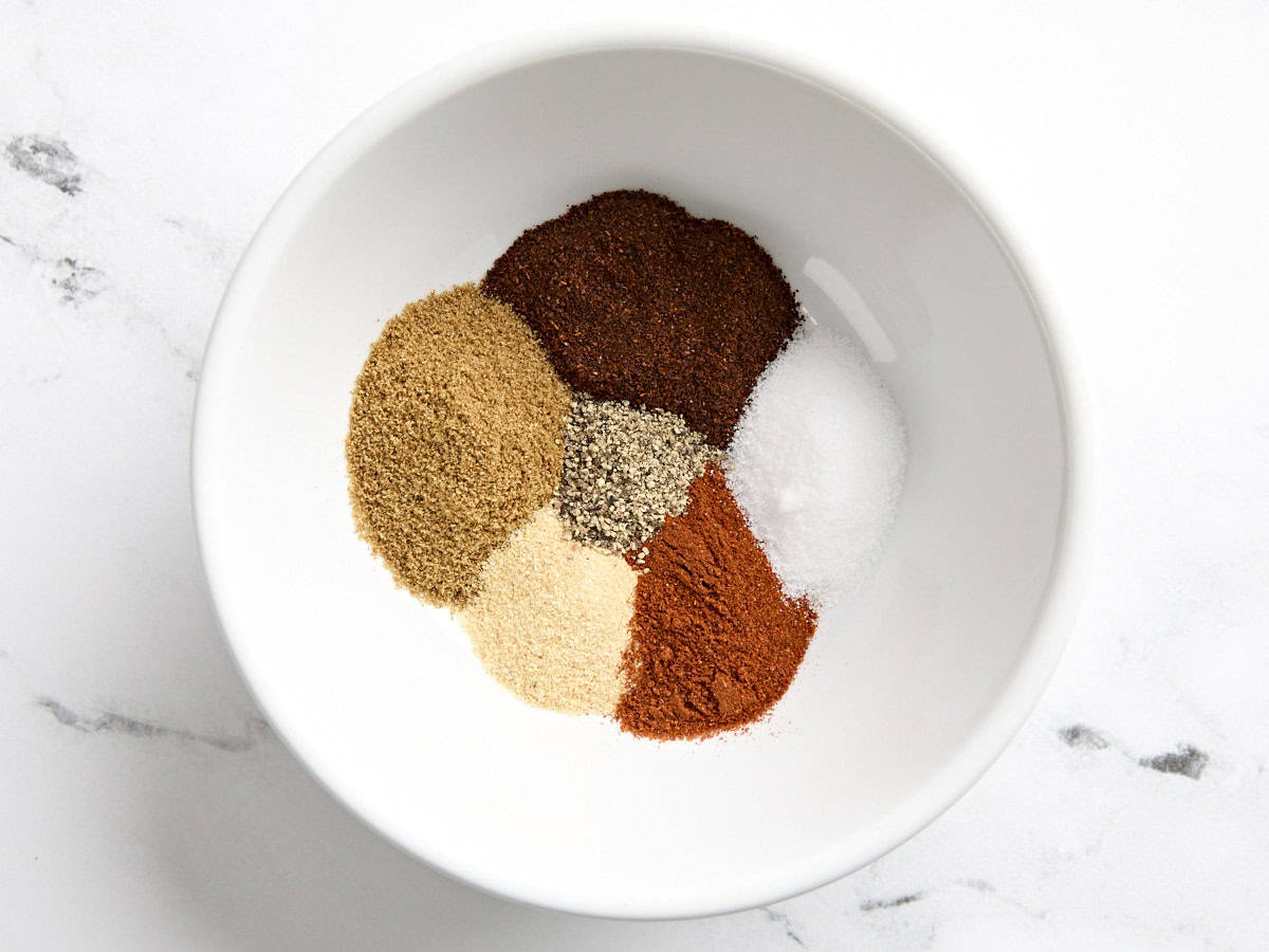 The ingredients for homemade fajita seasoning in a bowl.