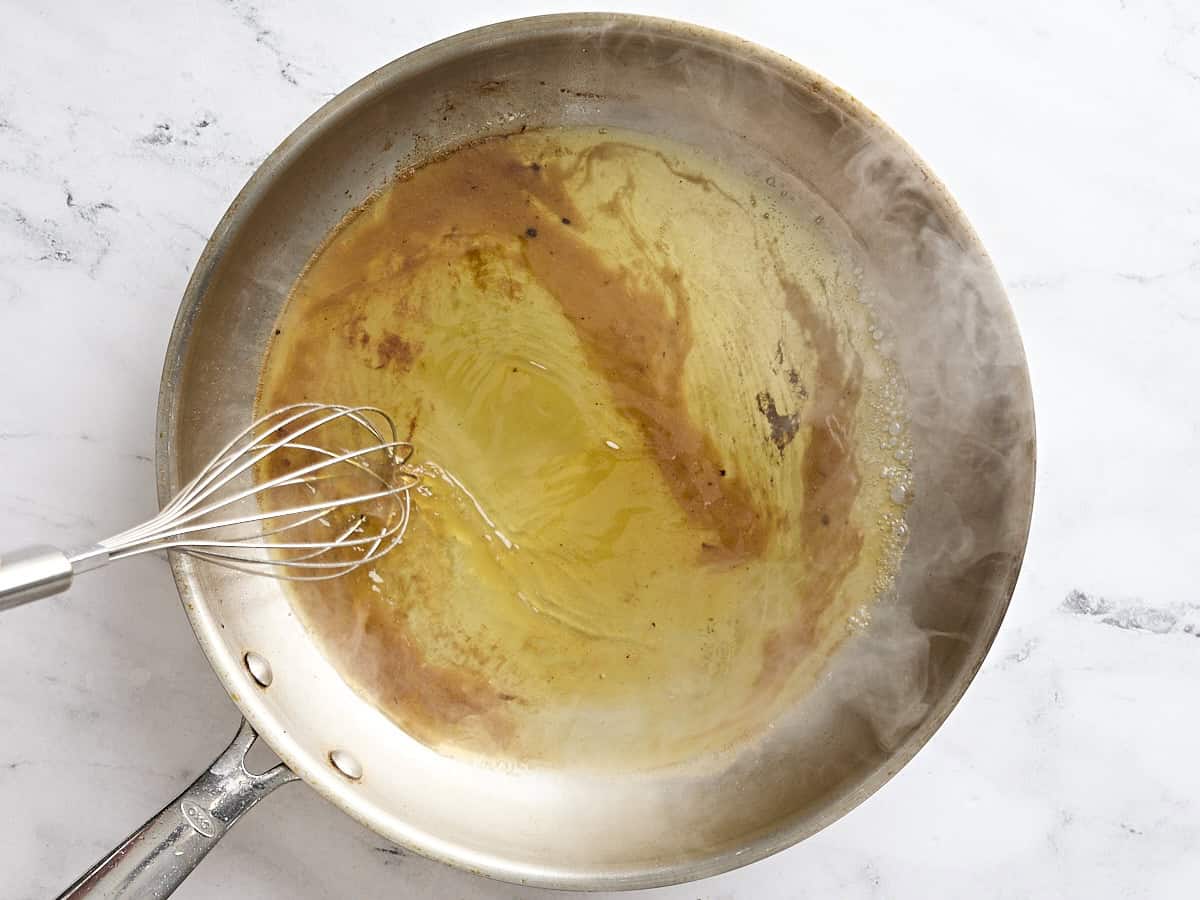 Pepperoncini juice deglazing a skillet.