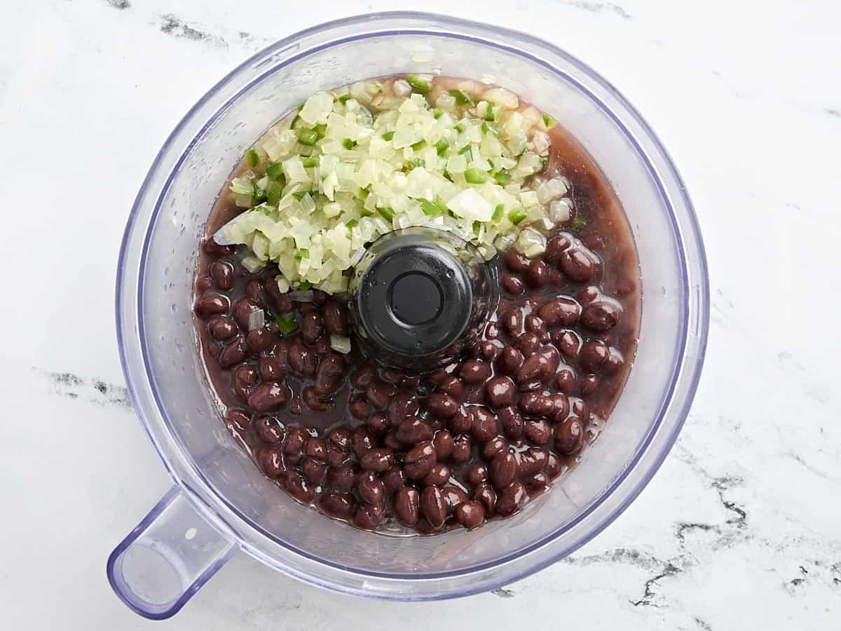 Black beans and sauted onions and jalapenos in a food processor.