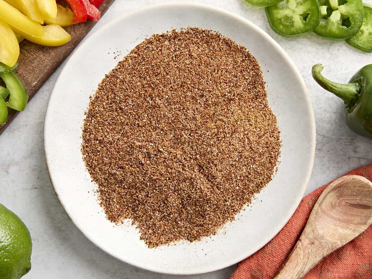 Overhead view of fajita seasoning on a plate.