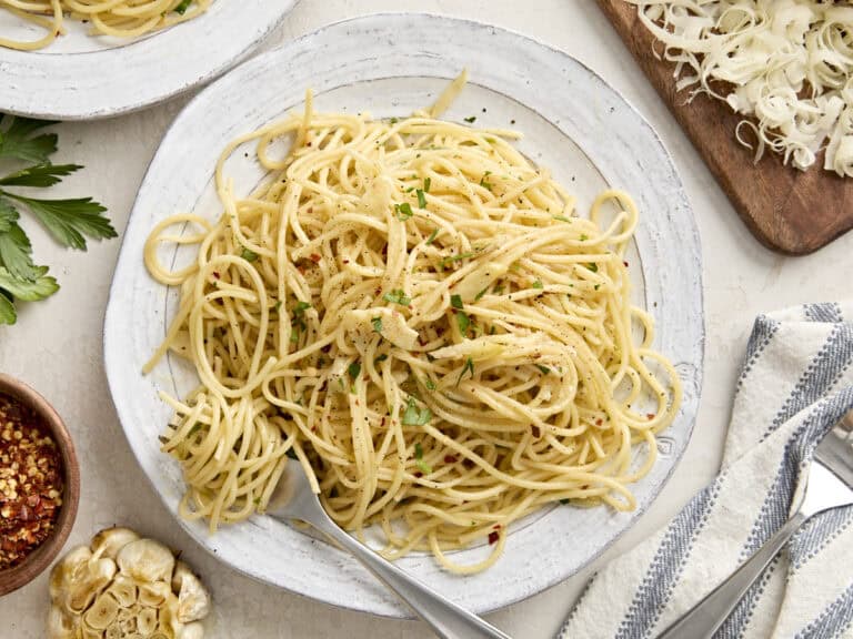 Overhead view of Spaghetti Algio e Olio on a plate with a fork.