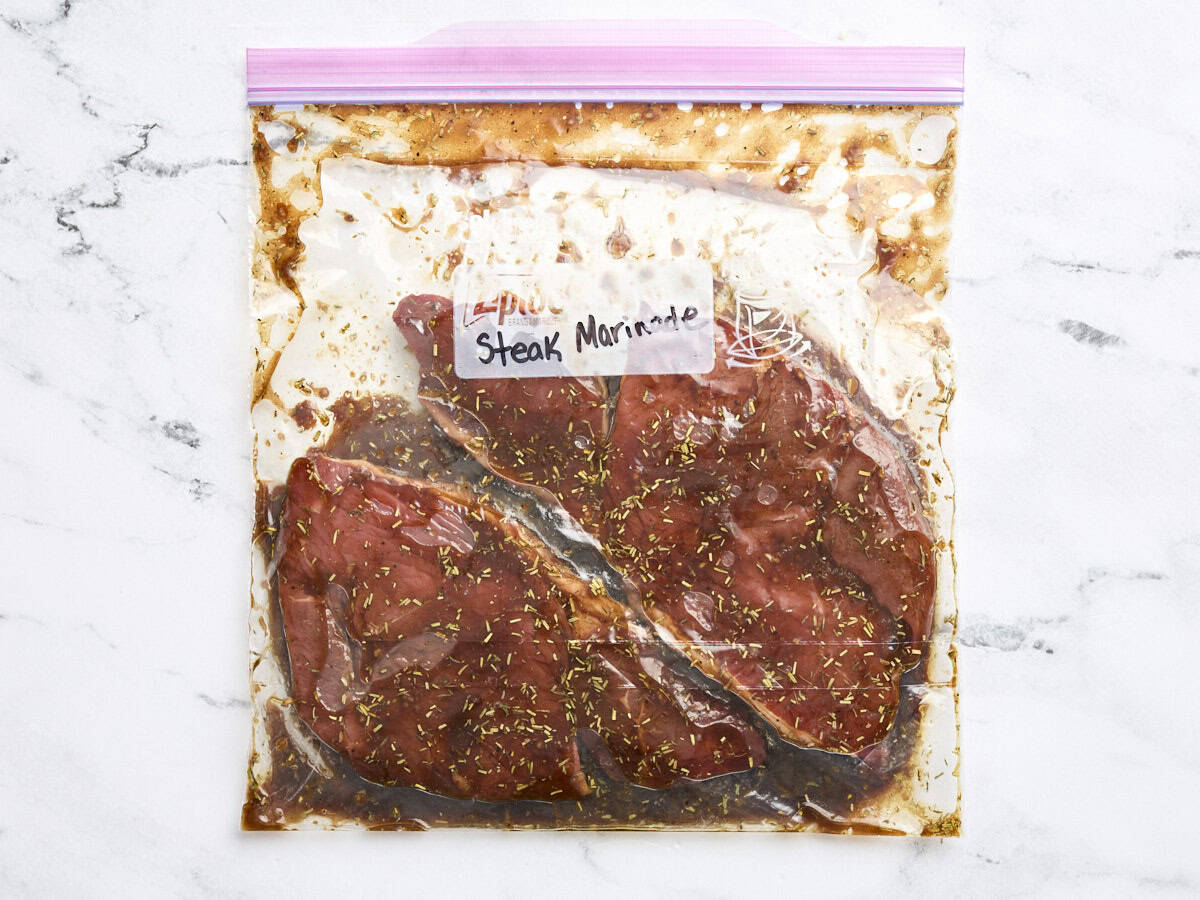 Steak marinading in a ziptop bag.