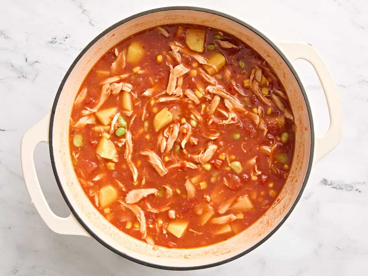 Homemade Brunswick stew in a pot before simmering.