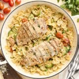 Overhead view of Overhead view of Pasta Primavera with chicken in a skillet.