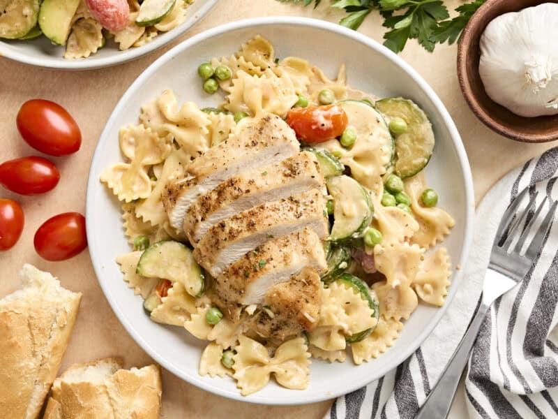 Overhead view of a plate of Chicken Pasta Primavera.