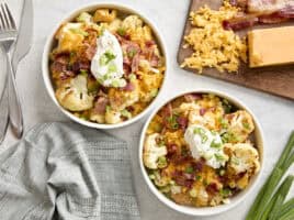 Overhead view of two loaded cauliflower bowls.