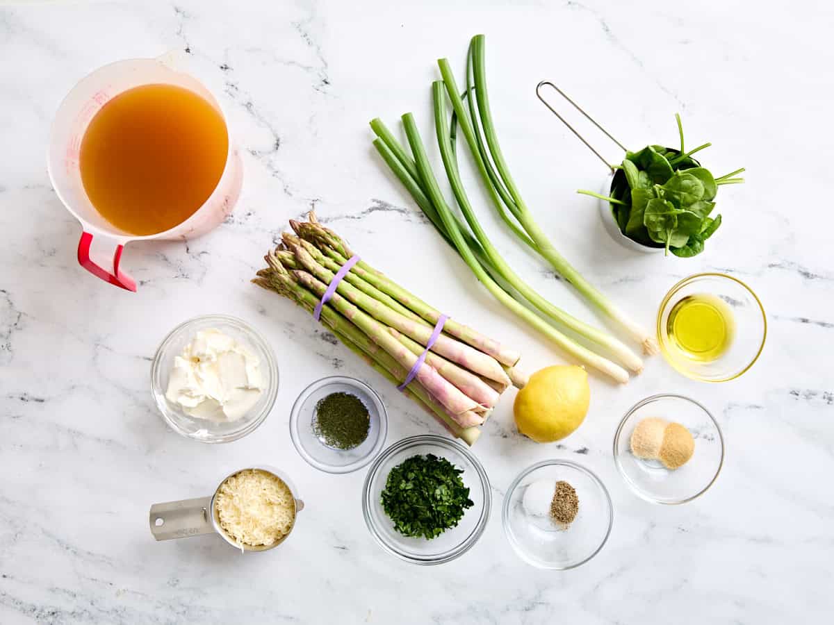 The ingredients needed to make asparagus soup.