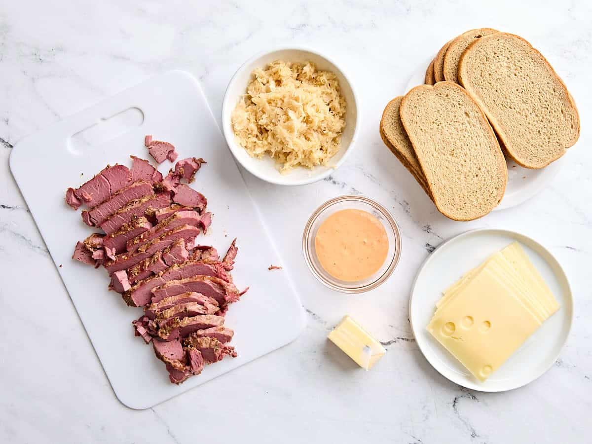 The ingredients to make a Reuben Sandwich.