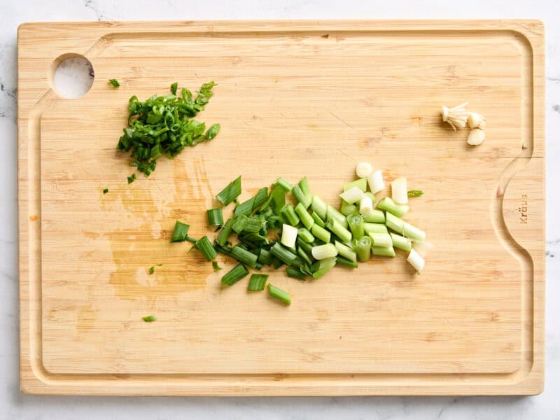 Sliced onion on a cutting board.