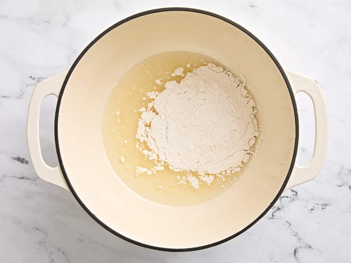 Flour and cooking oil in a skillet to make a roux.