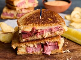 Side view of a reuben sandwich.