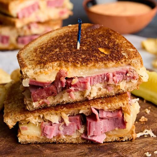 Side view of a reuben sandwich.