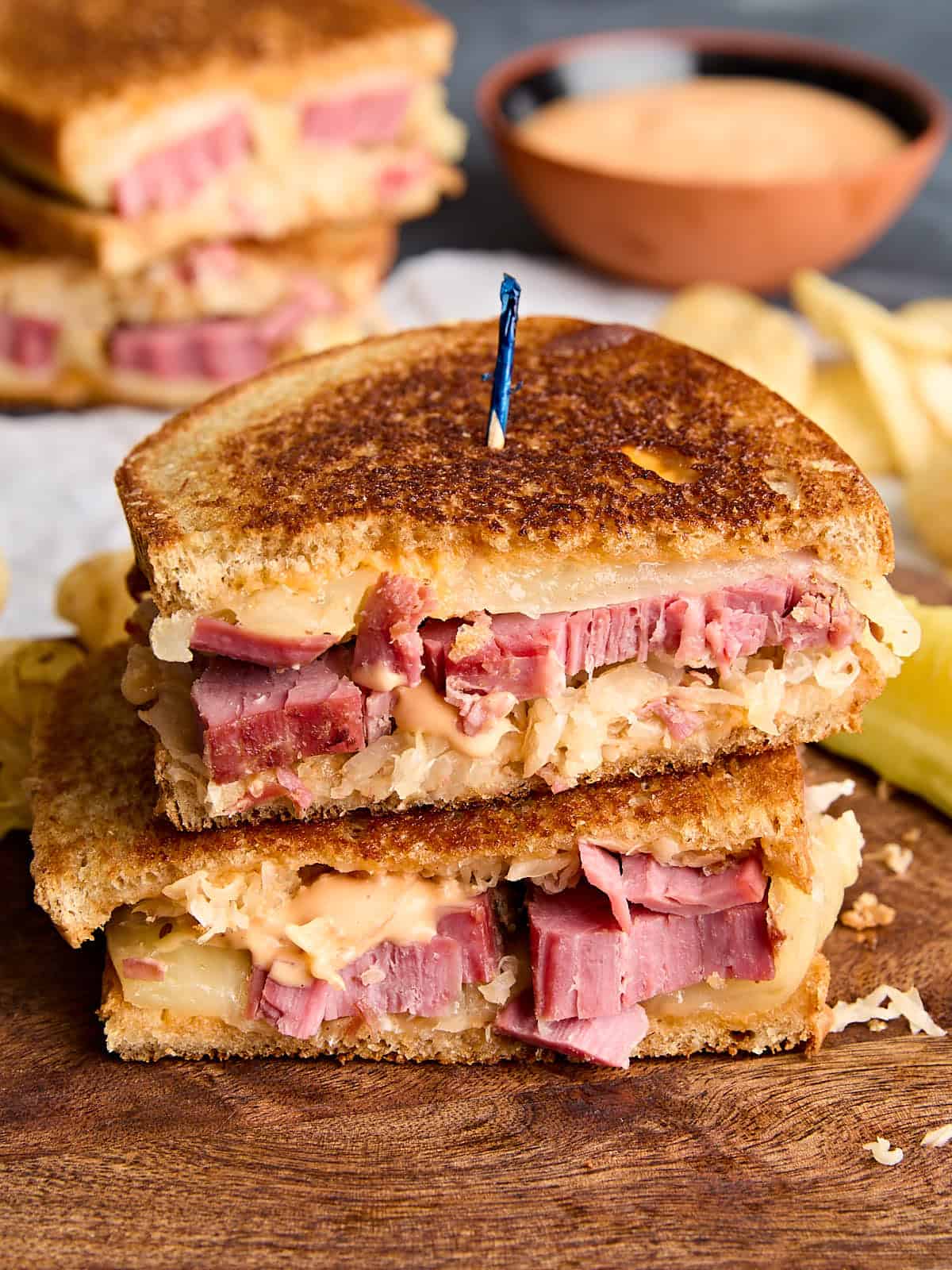 Side view of a reuben sandwich.